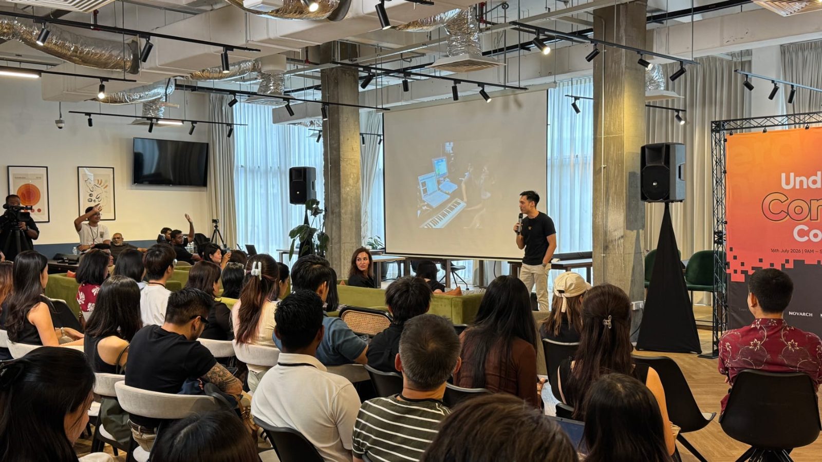 Reuben Ch’ng on stage at Underdog Content Con 2026