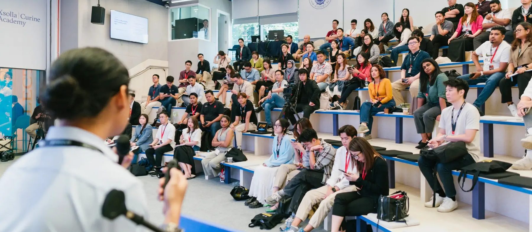 A full lecture hall at Underdog Con
